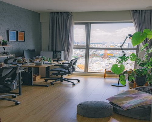 Ergonomic home office setup in a modern apartment living room